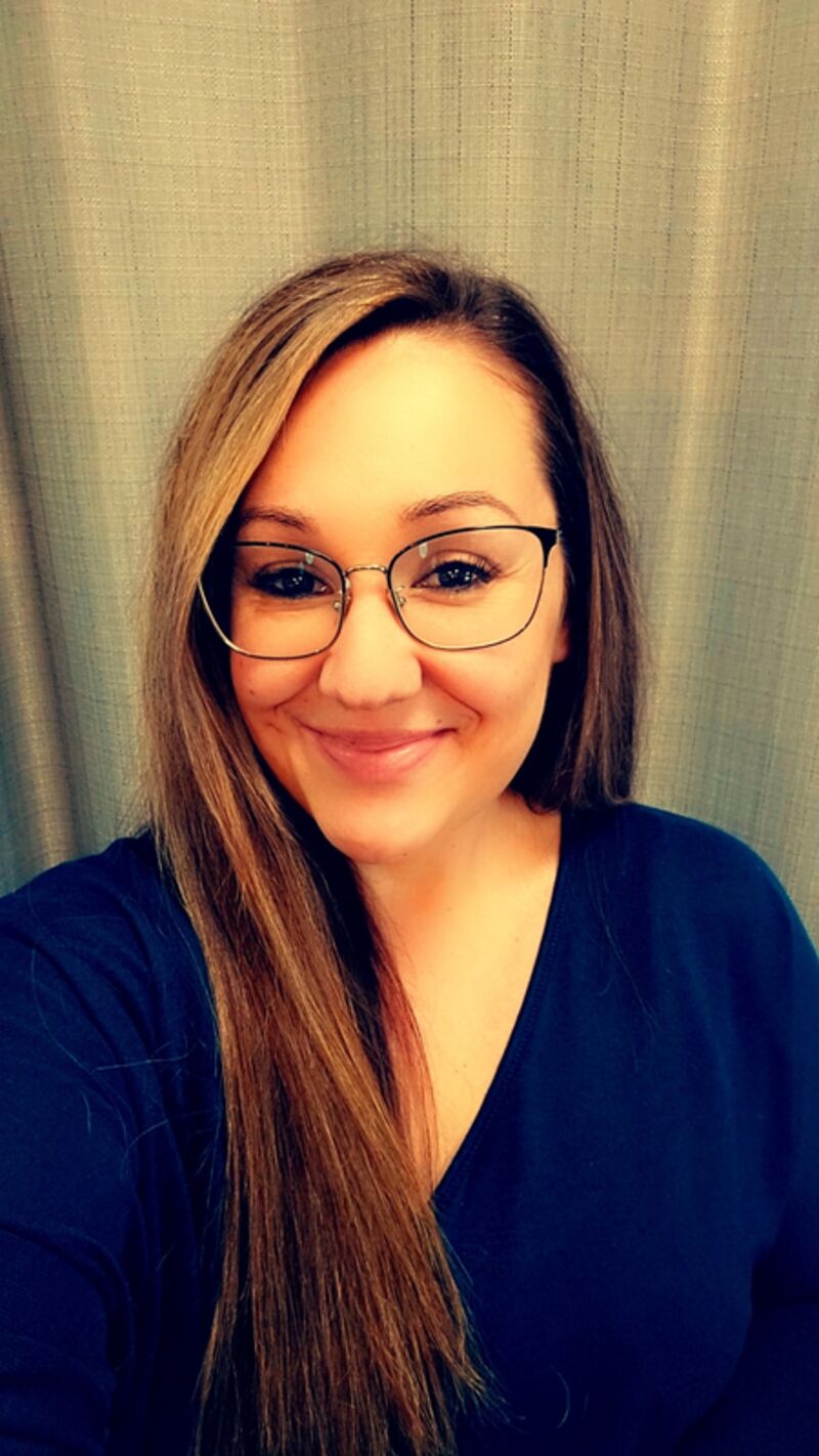 Cynthia Mejia at her desk